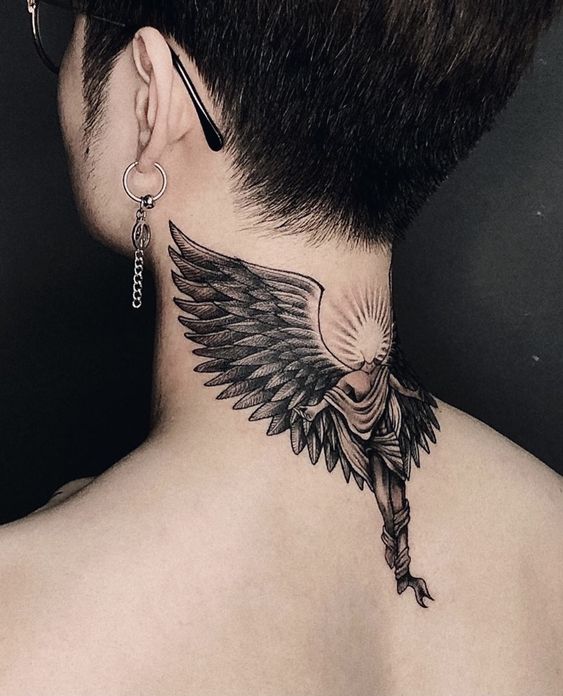 Angel wings tattoo on back neck for Guys