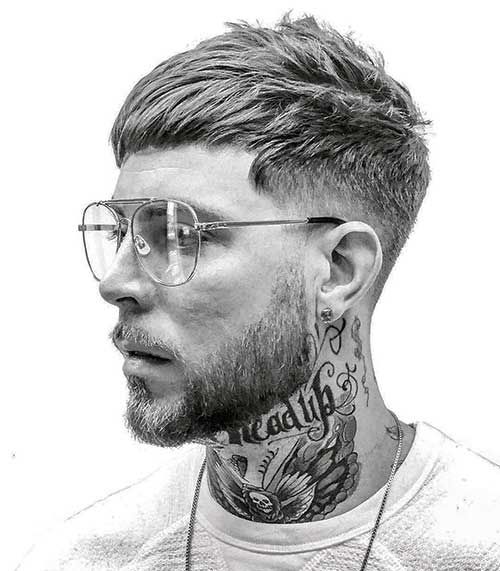 Men with glasses having gangsta look tatto on neck