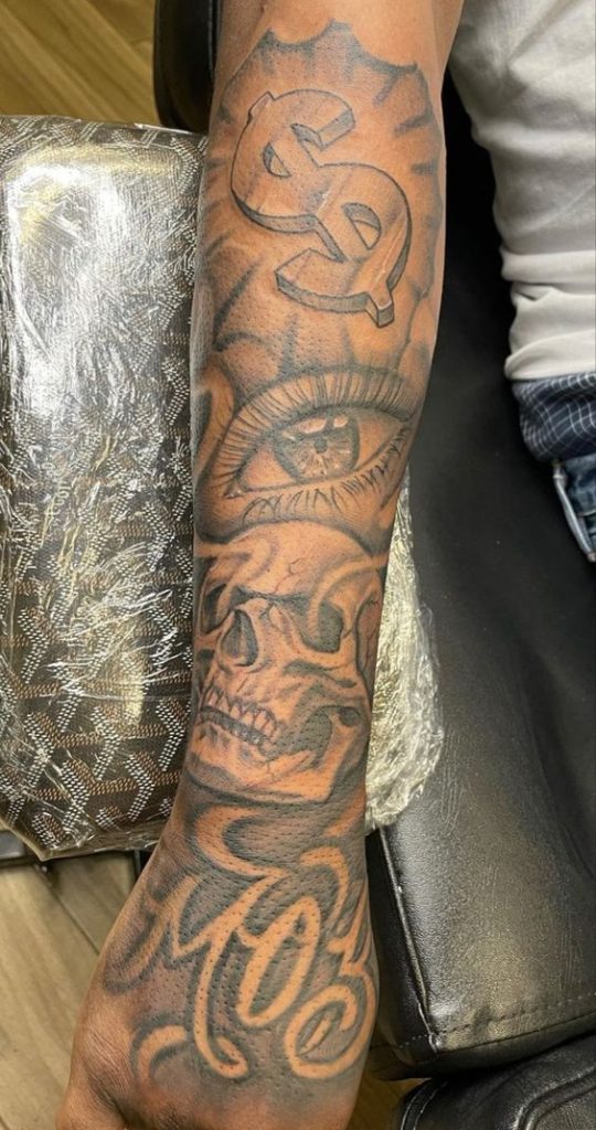 Dollar sign Gangster hood forearm tattoos