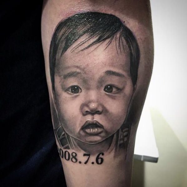 Cry baby tattoo with real baby face