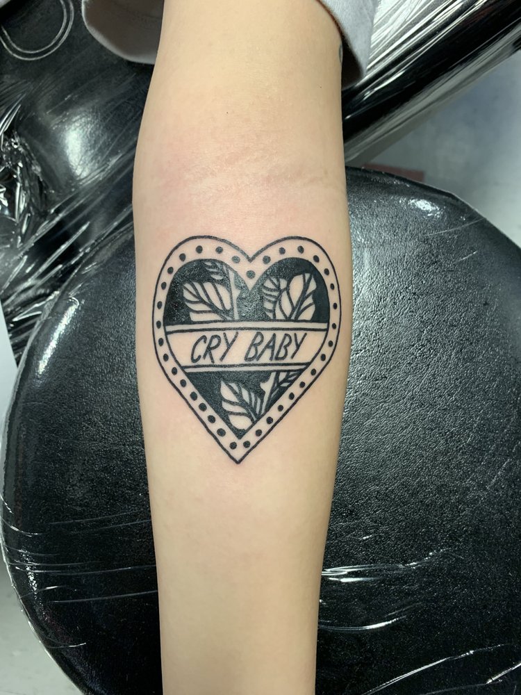 Cry baby tattoo inside heart