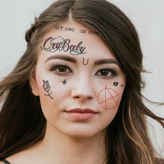 Cry baby tattoo on girl forehead