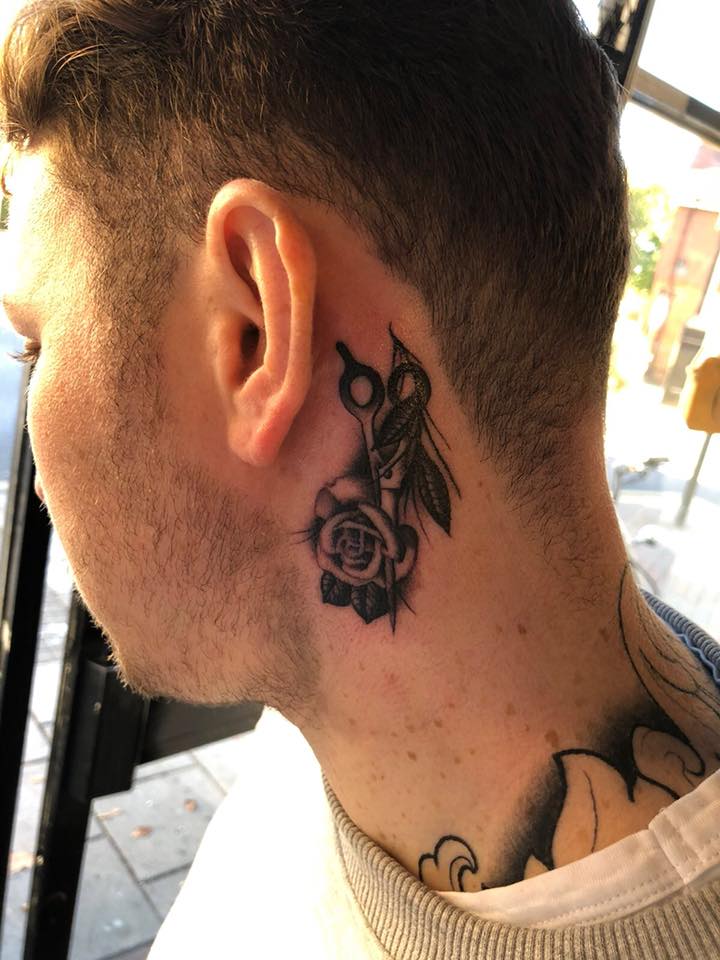 Behind the ear tattoo for men design