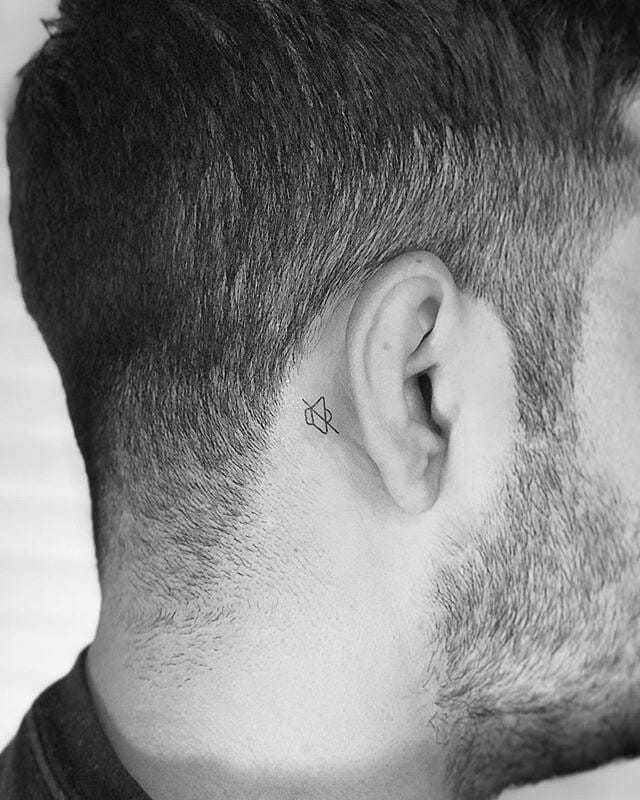 Small Design behind ear tattoo for Pakistan