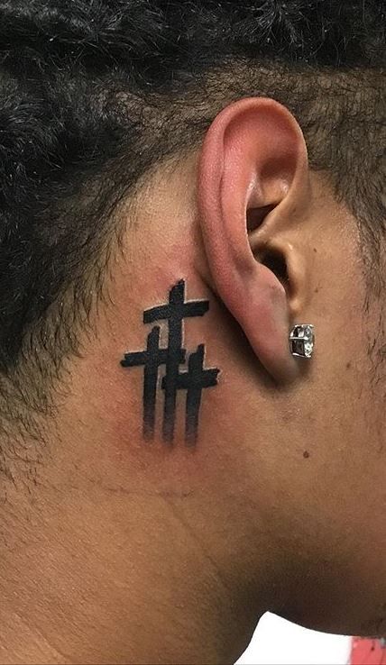 Three Cross tattoo behind ear for men
