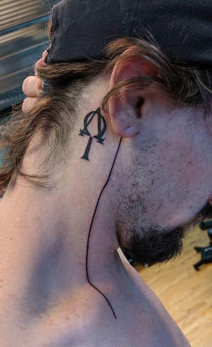 Behind the ear tattoo for men