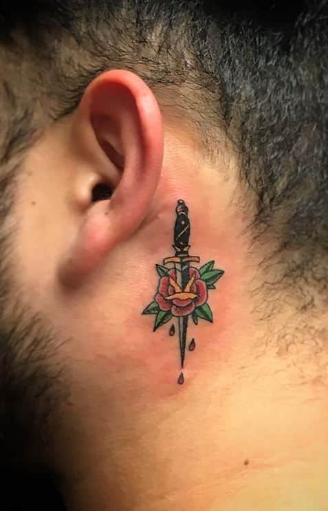 Sword tattoo for men behind the ear