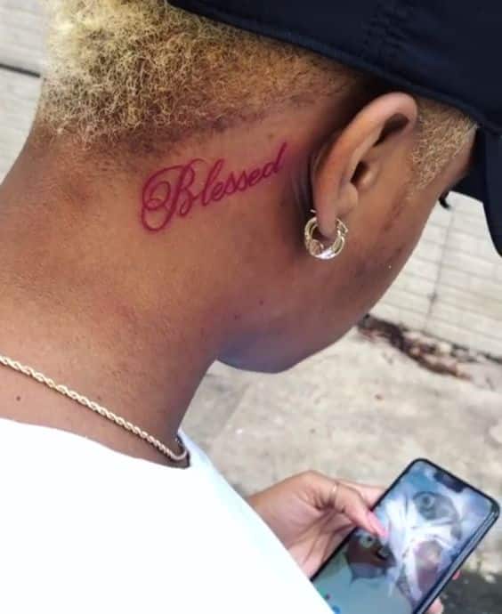 Blessed Behind ear tattoo for men