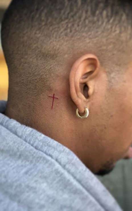 Slim Cross Behind ear tattoo for men