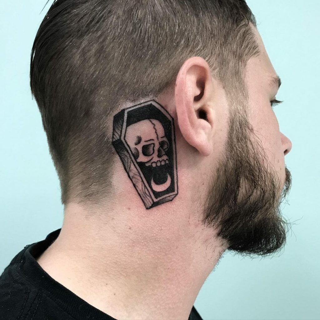 Skull in Coffin Behind ear tattoo for men