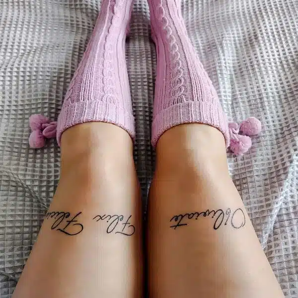 above knee tattoo for girls