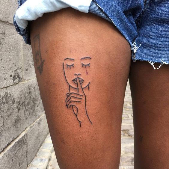 silent girl Above Knee Tattoo design