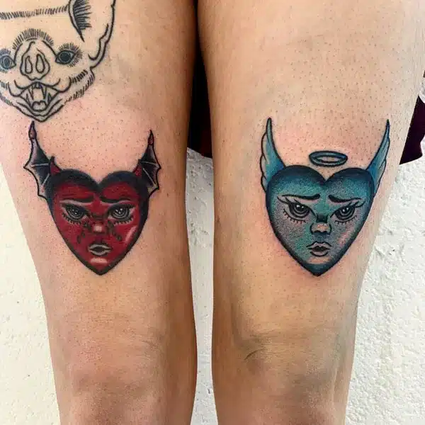 above knee tattoo on both legs