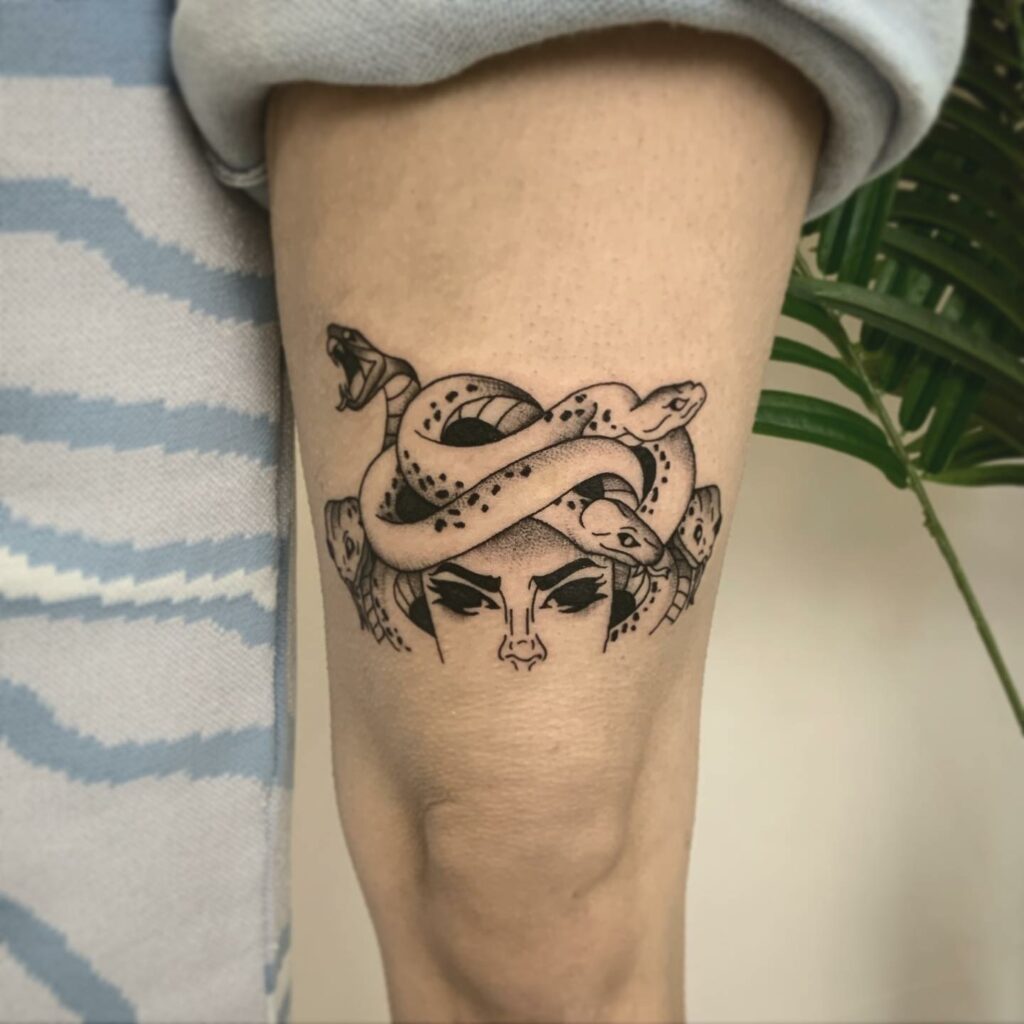 Snake queen Above Knee Tattoo design