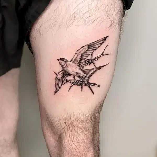 Bird above knee Tattoo