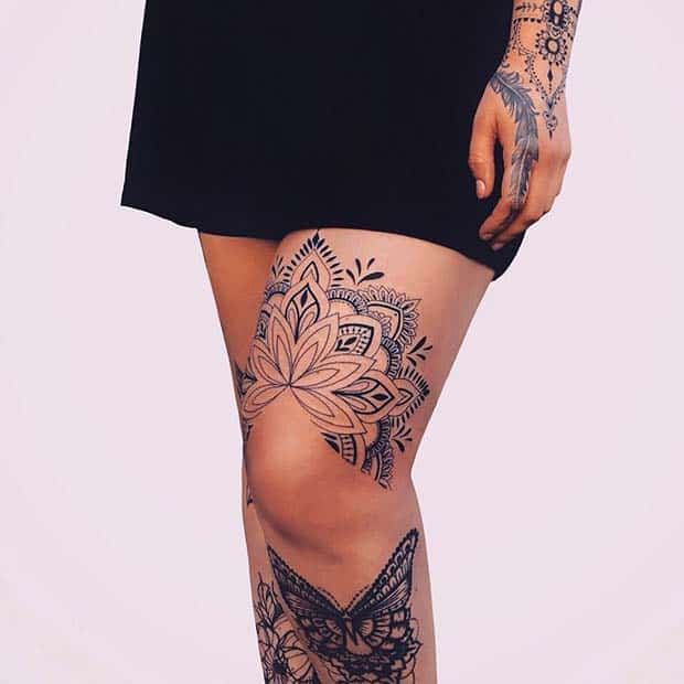Flowers above knee tattoo