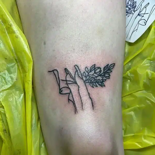 Fingers above knee Tattoo