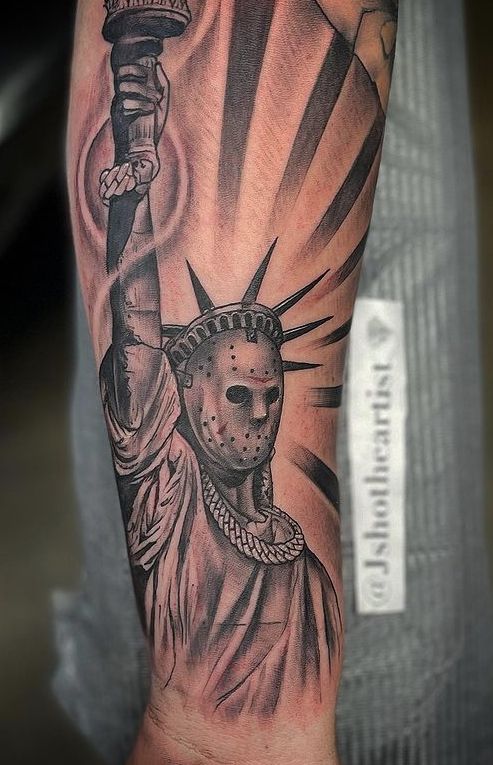 Statue of Liberty forearm tattoo design
