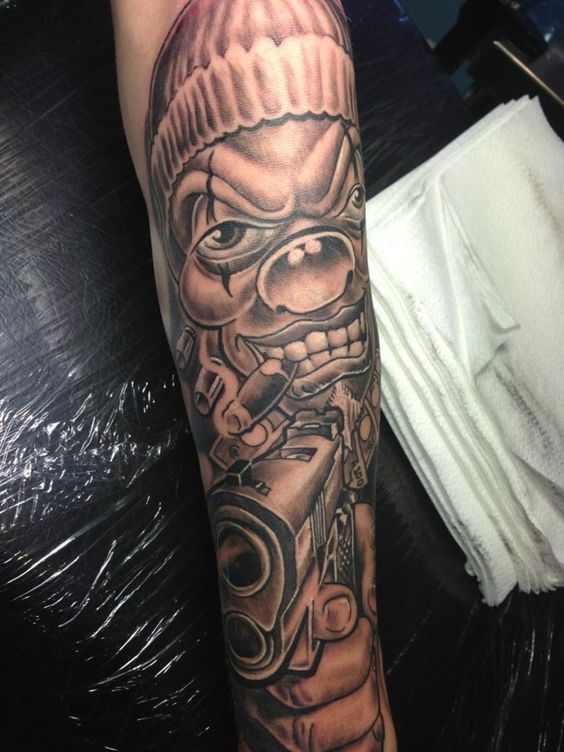 Deadly Gangster hood forearm tattoos