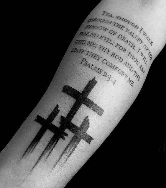 3 Cross Tattoo with verses written on forearm