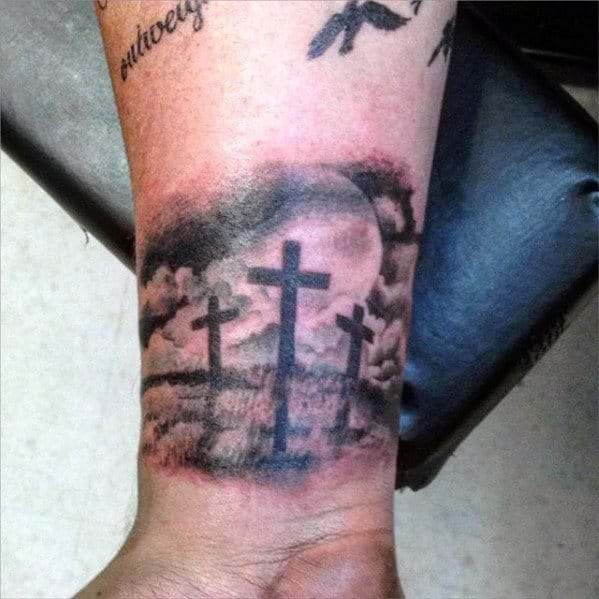 3 Cross Tattoo shades on wrist