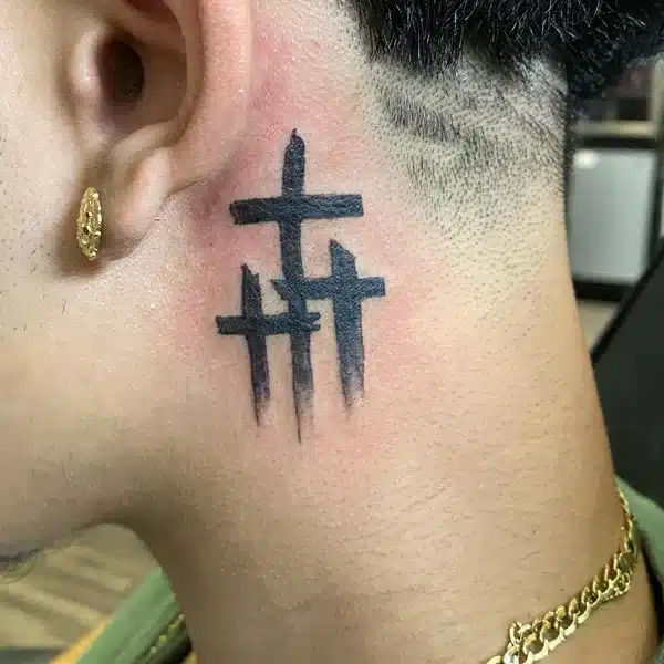 3 Cross Tattoo behind ear above neck