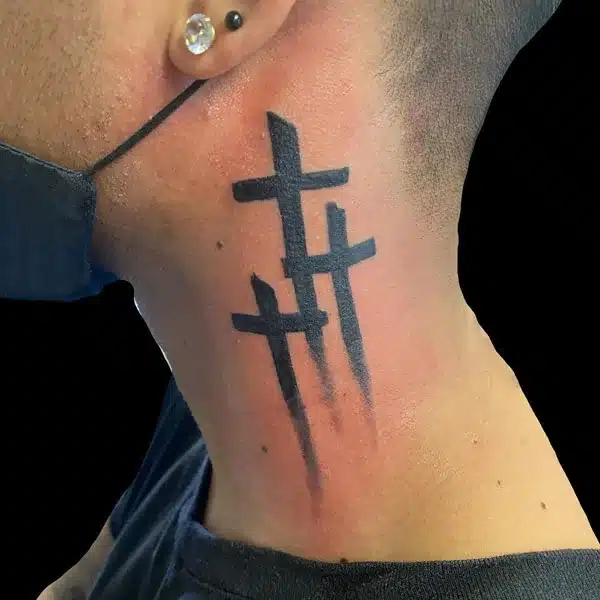 3 Cross Tattoo on neck for a young men