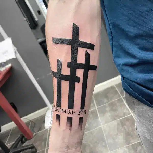 3 Cross Tattoo on a forearm with Jeremiah 29:11