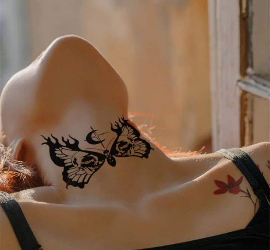 Beautifull butterfly Tattoo on girl neck