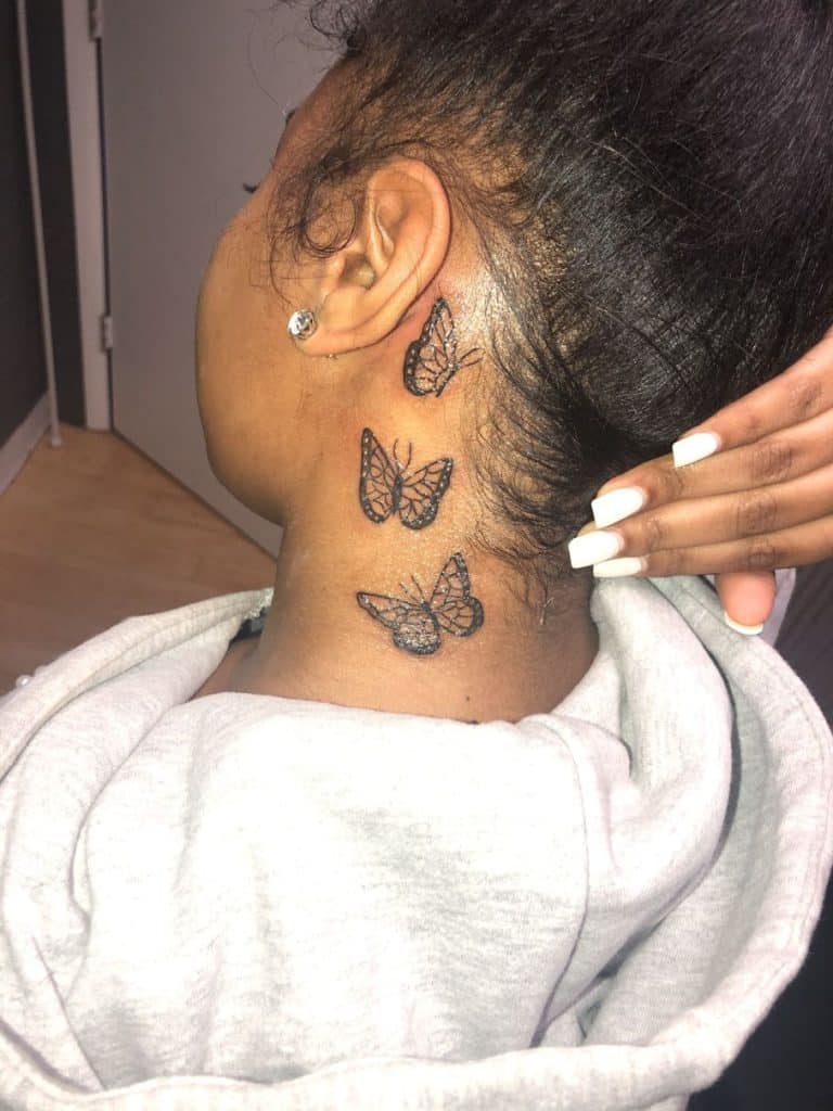 Butterfly Neck Tattoo on black girl