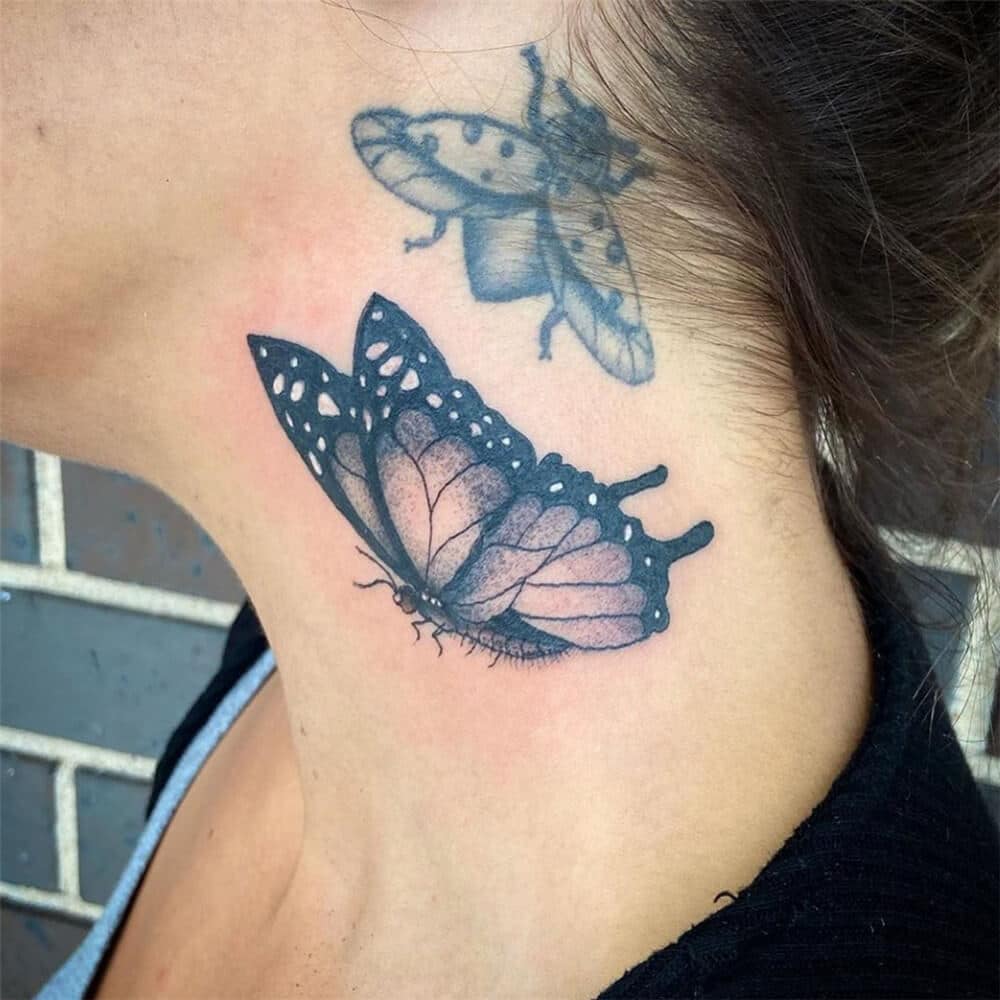 Two butterfly neck tattoo