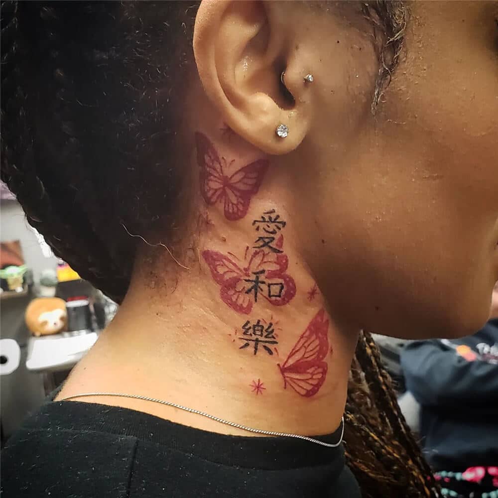 Red butterfly Tattoo on neck