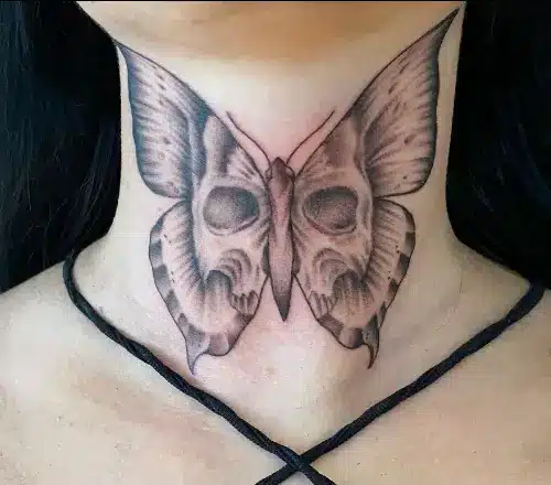 butterfly tattoo covering whole neck