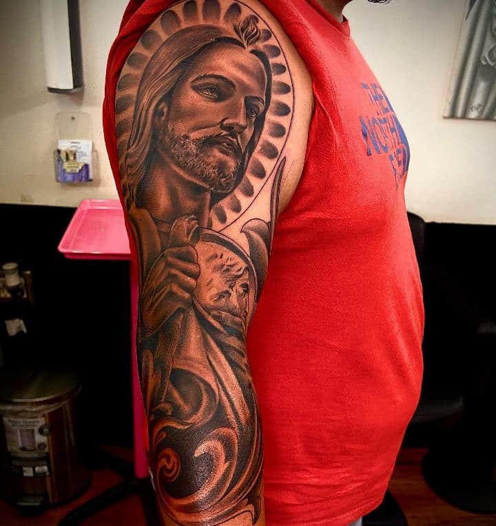 A Tattoo of san judas on forearm nice patchwork