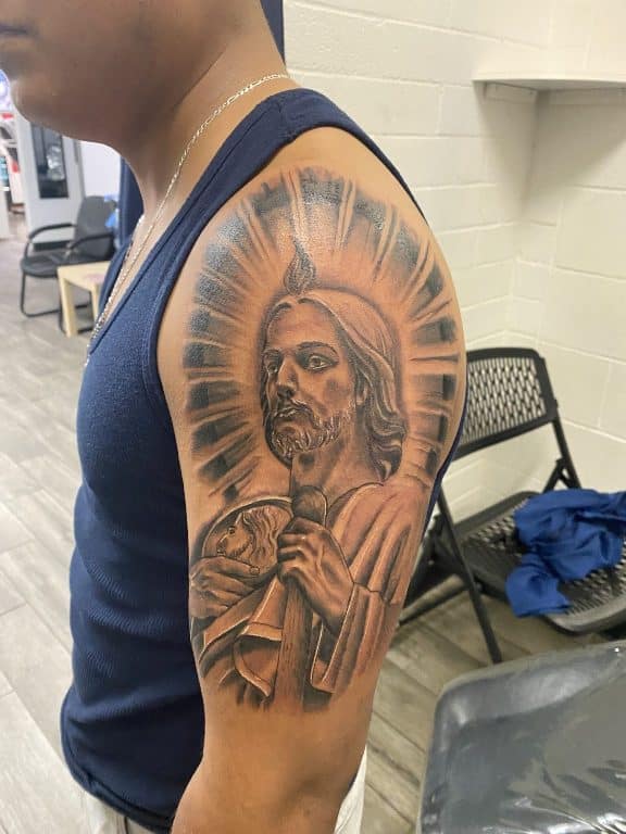 Men having San Judas Tattoo on Shoulder