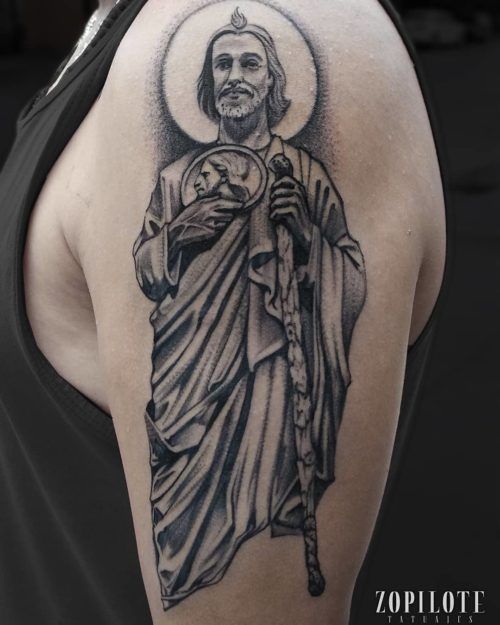 a Tattoo of San Judas on Shoulder