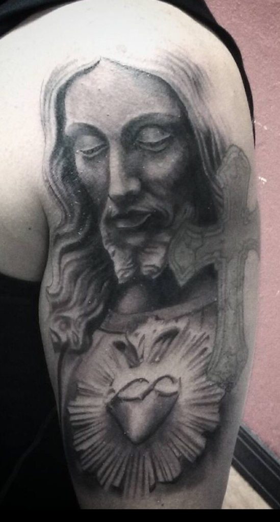 San Judas Tattoo on Shoulder