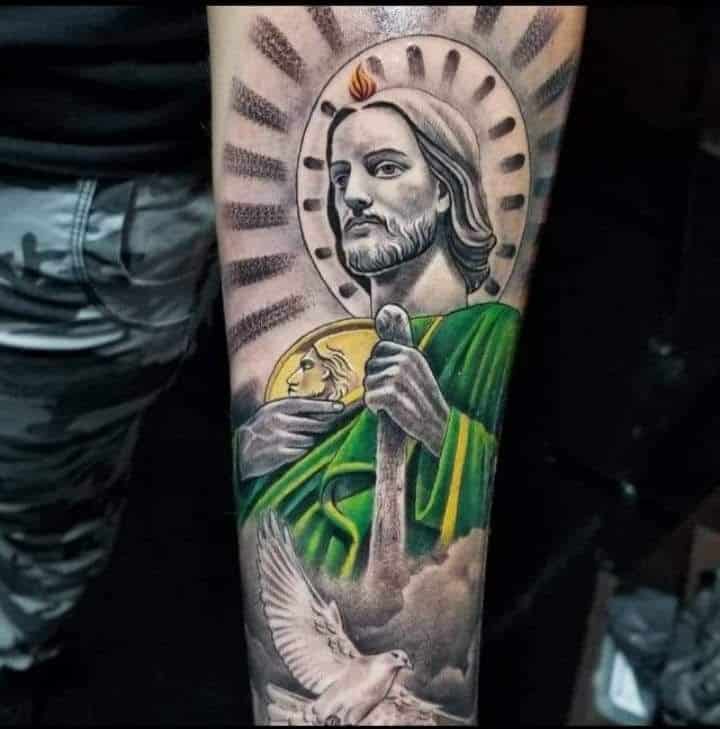 San Judas Tattoo on Forearm with Pigeon