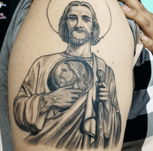 Big grey San Judas Tattoo on Shoulder