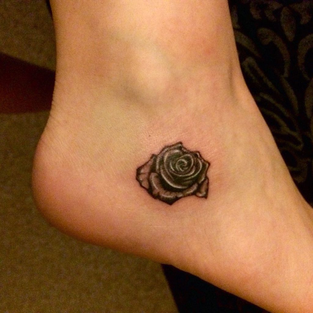 A small Rose Tattoo on foot