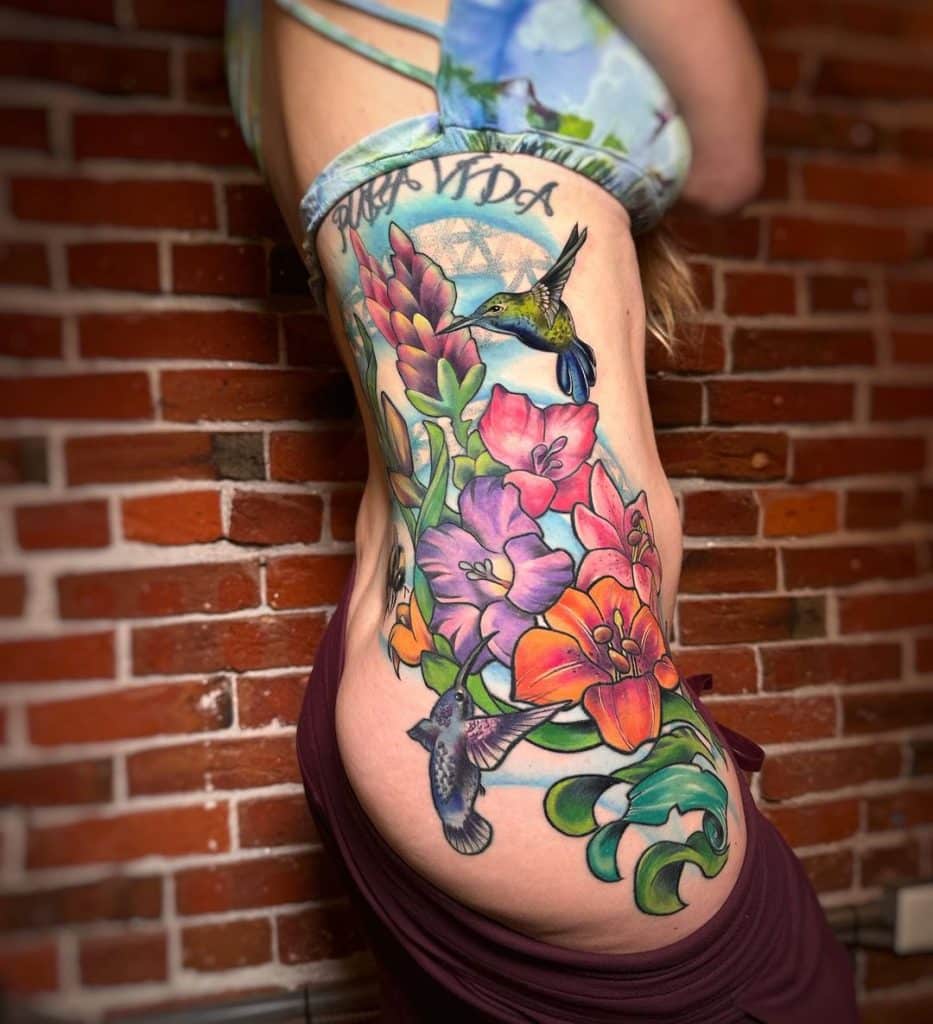Birds on colorful flowers for side belly tattoo for girls
