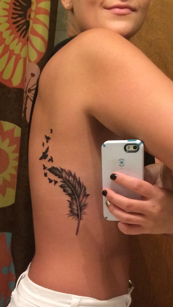 Birds on wing side belly tattoo for girls