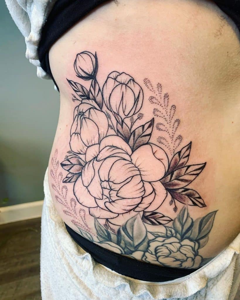 plants and flowers for side belly tattoo for girls