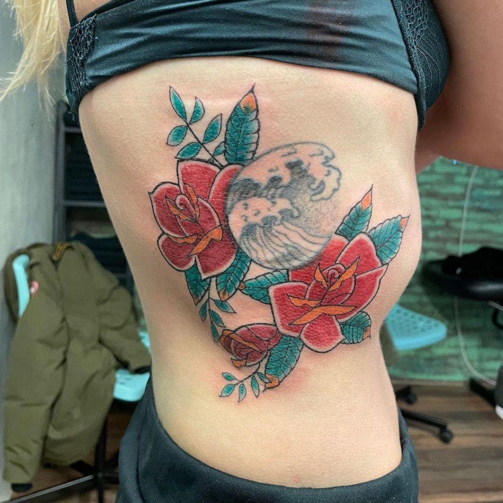 red and green flowers for side belly tattoo for girls