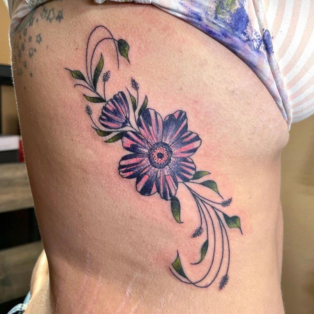 flowers side belly tattoo for girls