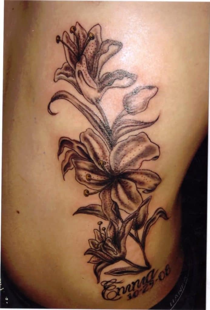 simple plant  side belly tattoo for girls
