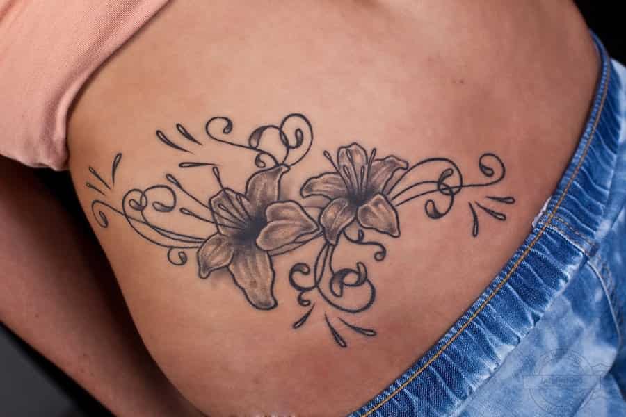 flowers creeper for side belly tattoo for girls