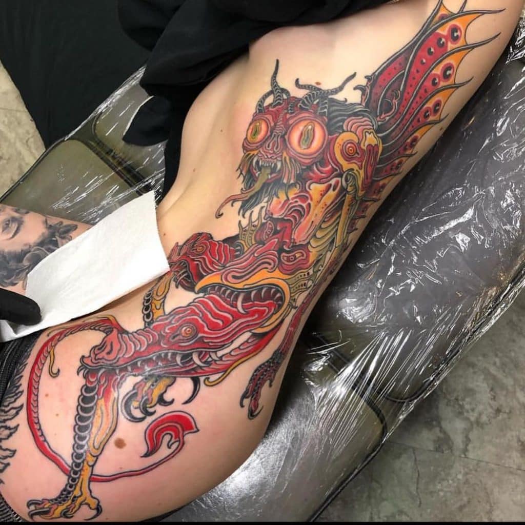 red dragon side belly tattoo for girls