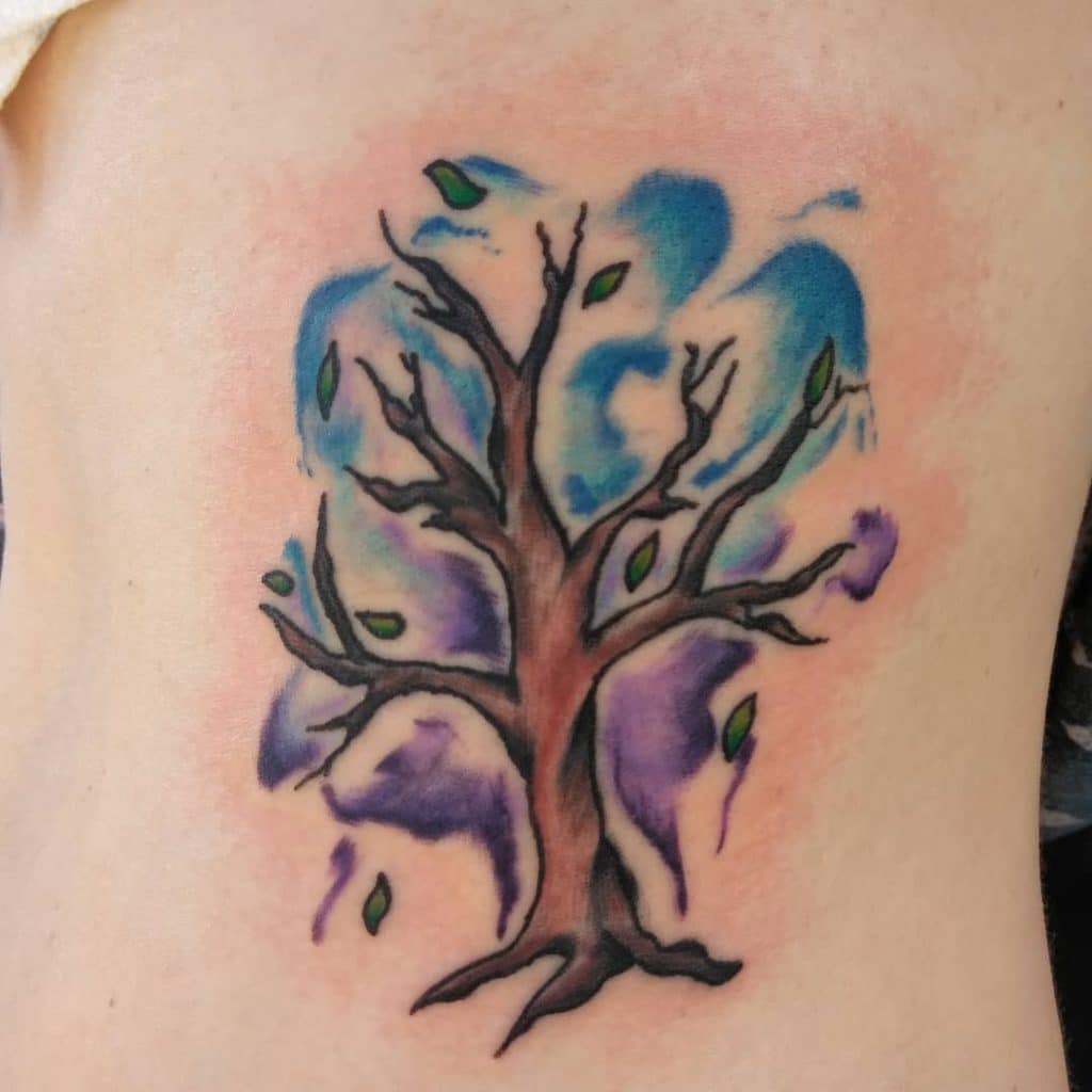 Tree of Life side belly tattoo for girls
