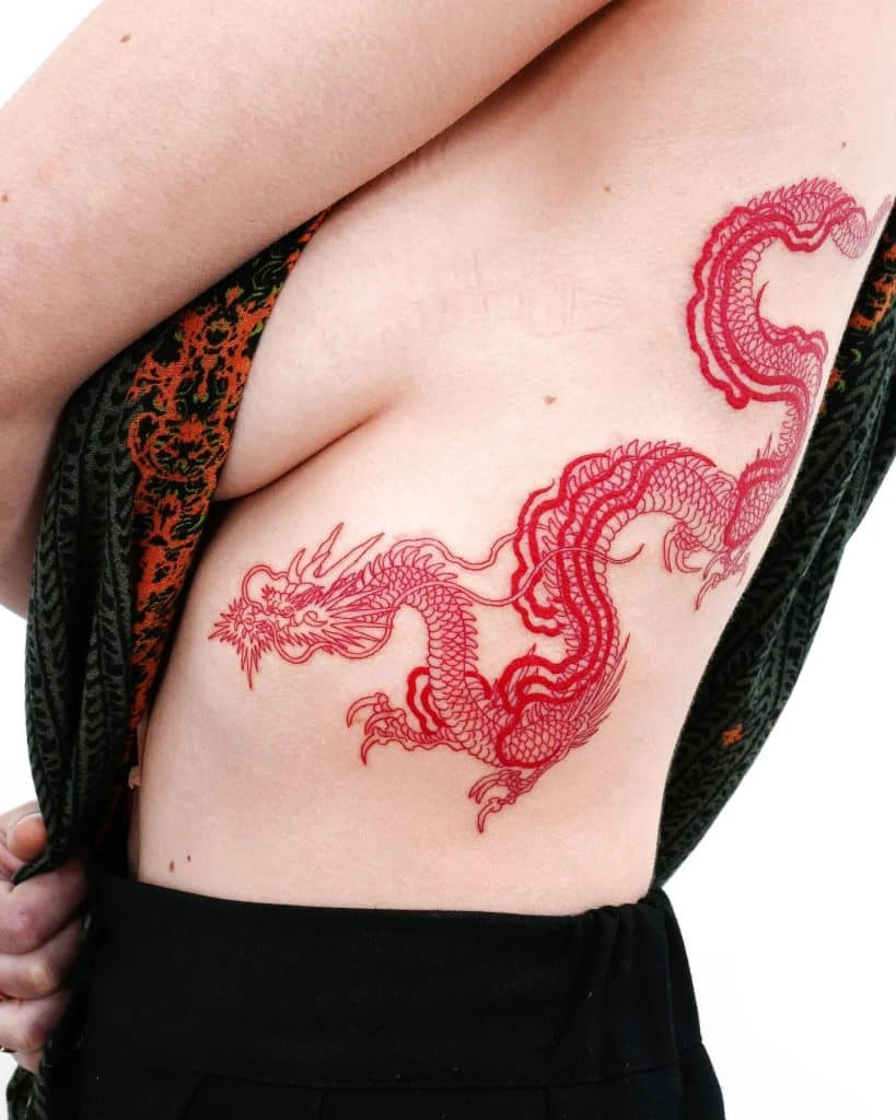 Red snake and dragon style side belly tattoo for girls